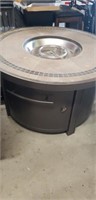 Fire pit tablewith tile top, metal base cabinet