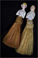 Two vintage half-doll table brushes
