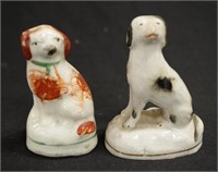 Two miniature Victorian Staffordshire Dog figures