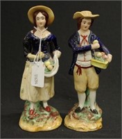 Pair Victorian Staffordshire Fruit seller figures