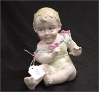 German porcelain piano doll