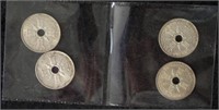 Four Territory of New Guinea silver shillings
