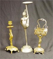 Three decorative case metal table wares