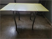 50's Yellow laminate & chrome drop leaf table..
