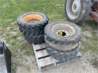 Set of Skidsteer tires/rims.