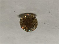 Apprx .75CT Round Strontium Titanate