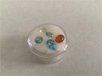 Capsule of Gemstones