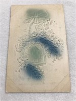 Embossed blue flower basket postmarked 1909
