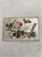 Embossed a merry Christmas postcard