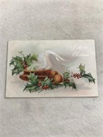 A merry Christmas postcard with Holly