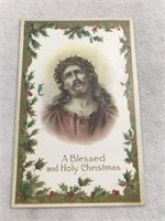 A blessed and holly Christmas postcard with Jesus