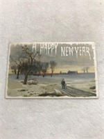 Postmarked 1909 embossed a happy new year