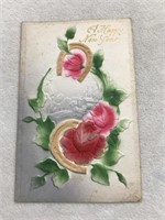 Postmark 1914 flower embossed a happy new year