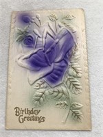 Embossed purple flower birthday greetings