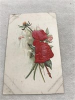 1907 embossed red flower postcard