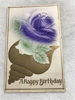 Postmarked 1911 embossed a happy birthday