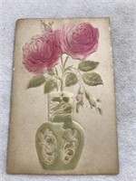Postmark 1909 vase with flowers embossed postcard