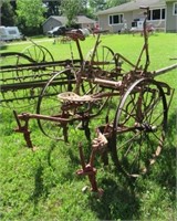 One Row Horse Drawn Cultivator on Steel Wheels.
