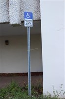 Three Handicap parking sign, no U turn sign, One W