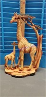 Wooden giraffe and babt
