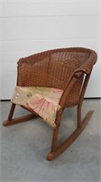 ANTIQUE CHILD'S WICKER ROCKER