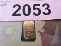 1/10th gram .999 pure gold bar in holder