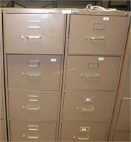 Two upright four drawer file cabinets 18" x 27" x