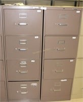 Two upright four drawer file cabinets 18" x 27" x