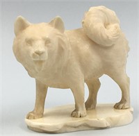 Lee Milot ivory carving of a husky