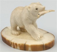 Antler carving of a bear