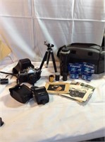 Canon AE 1 camera with camera case film tripod