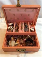 Vintage peach colored jewelry box with key with