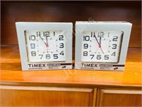 pair of timex wall clocks