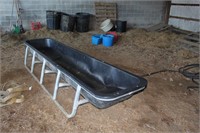 metal and plastic feeder for cattle , good shape