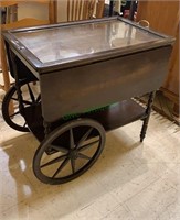 Vintage drop leaf tea cart with a glass