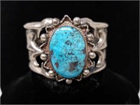 Navajo sand-cast silver bracelet with turquoise