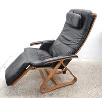 Bent plywood upholstered reclining lounge chair