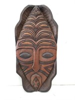 Carved wooden tribal plaque