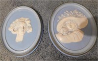 2 blue chalkware wall plaques, 11" h