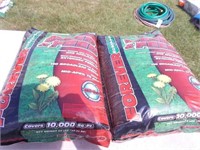 (2) Bags of Weed & Seed 32# Bags - Covers