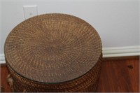 Woven Rattan basket with handles.