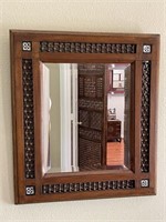 Egyptian style wood framed mirror