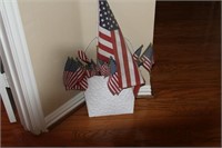 Metal wall sconce with US flags