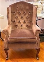 Mauve Queen Anne wing chair.