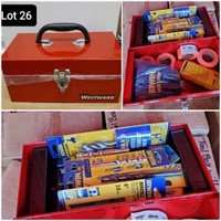 Red metal tool box with 26 tools included