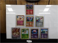 (1) Pokémon Promo & (7) Holo Pokémon Cards