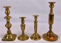 4 odd brass candlesticks, turned and cast, 6.5" to