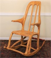 Exotic Carved Wood Rocking Chair