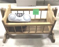 wooden doll cradle and small portable cd player