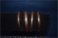 Four Copper Bangle Bracelets